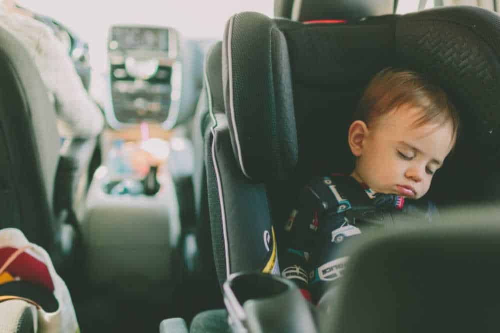 baby sleeping in carseat