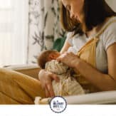young mom breastfeeding baby
