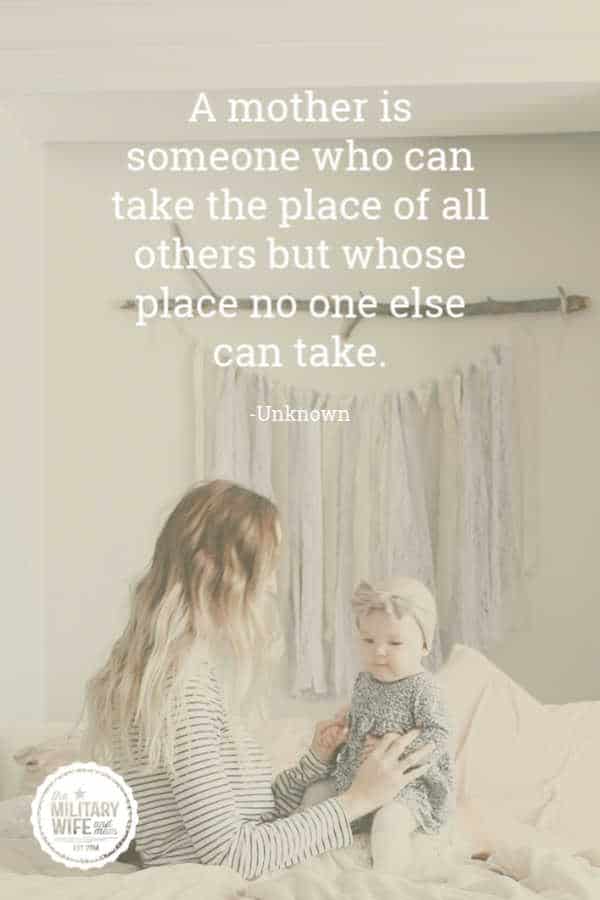 Mother and child sitting on bed with mom quote overlay in text