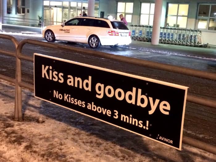 Funny quote at airport terminal drop off says, "Kiss and Goodbye. No kisses above 3 mins!"