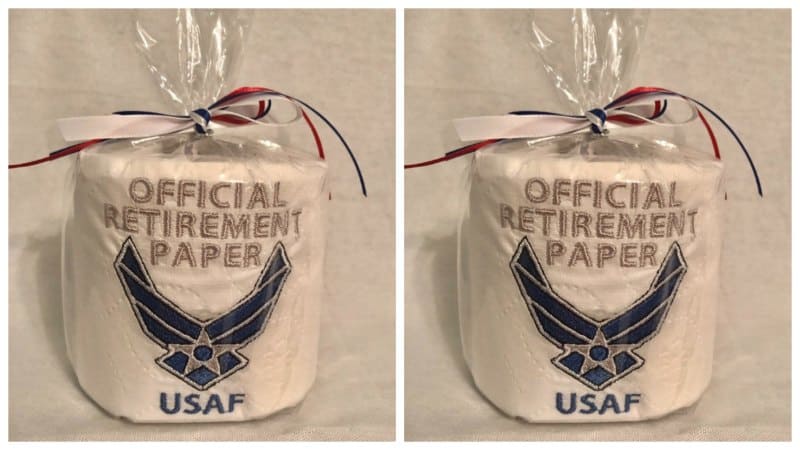 Toliet paper with wrapping that says "Official retirement paper US Air Force." 