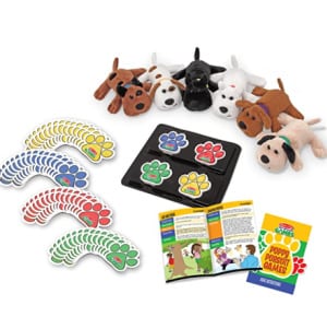Plush puppies, game pieces and board laid out