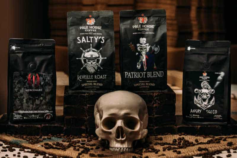 4 packages of pale horse coffee with skull in front