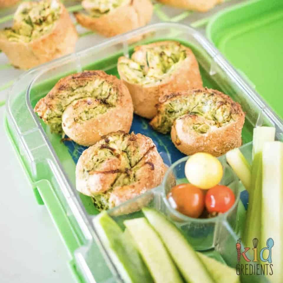 Spinach pinwheels and celery in tupperware