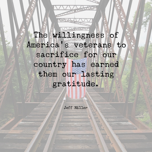Jeff Miller quote overlayed on image of train bridge with American flag